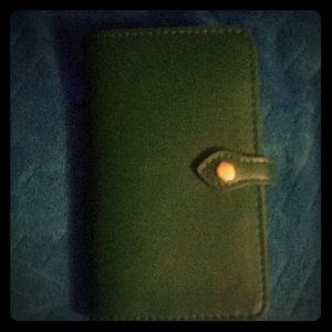 Wallet with cell phone holder